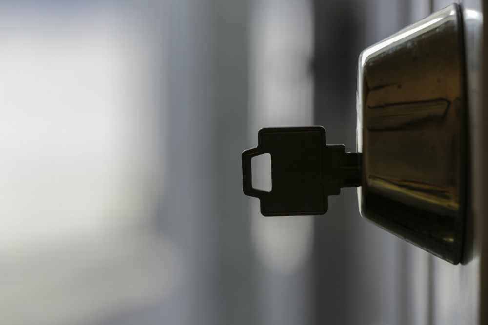 Professional key duplication and car key replacement Southfield MI being performed by a licensed locksmith.